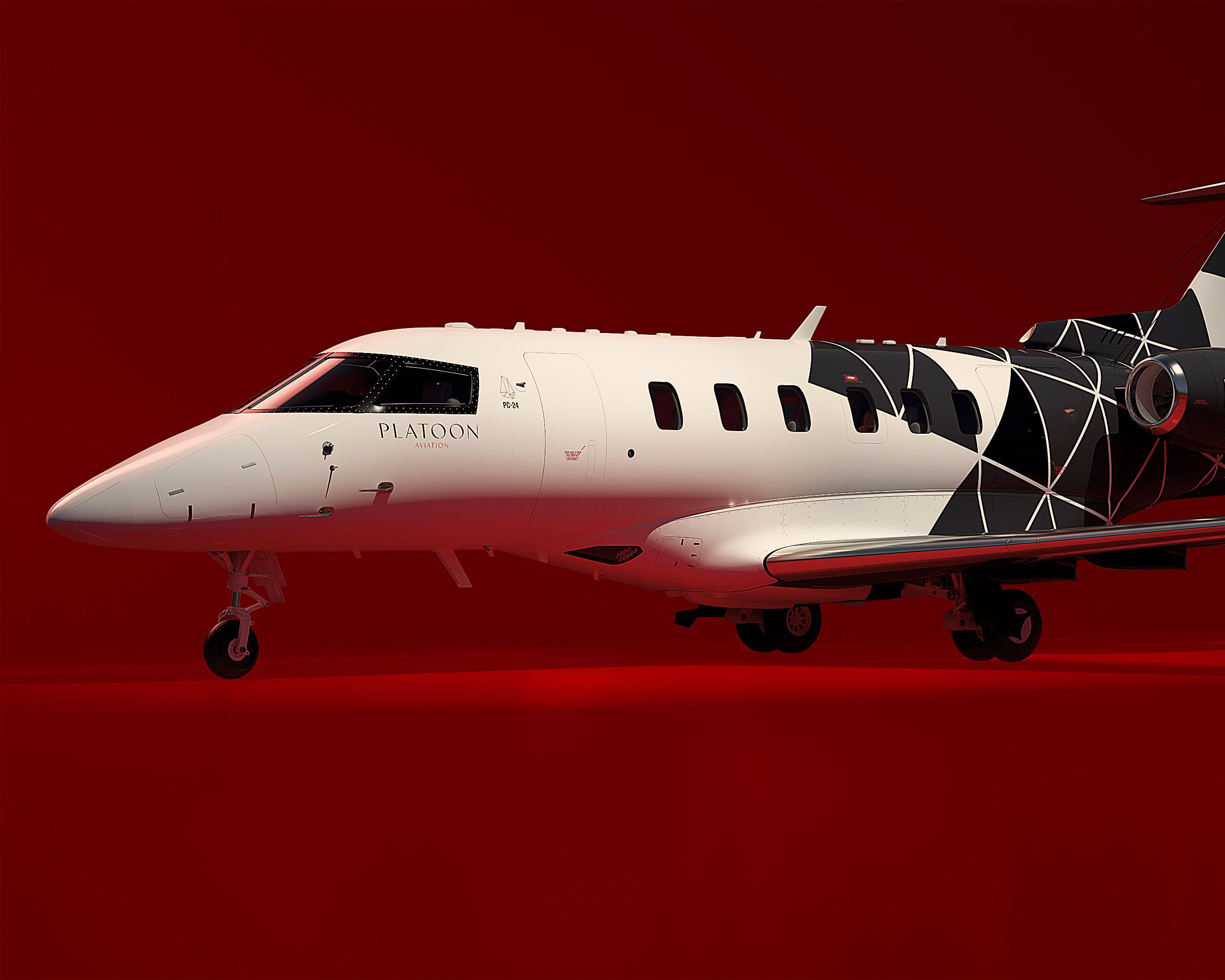 Pilatus PC-24 vor rotem Hintergrund